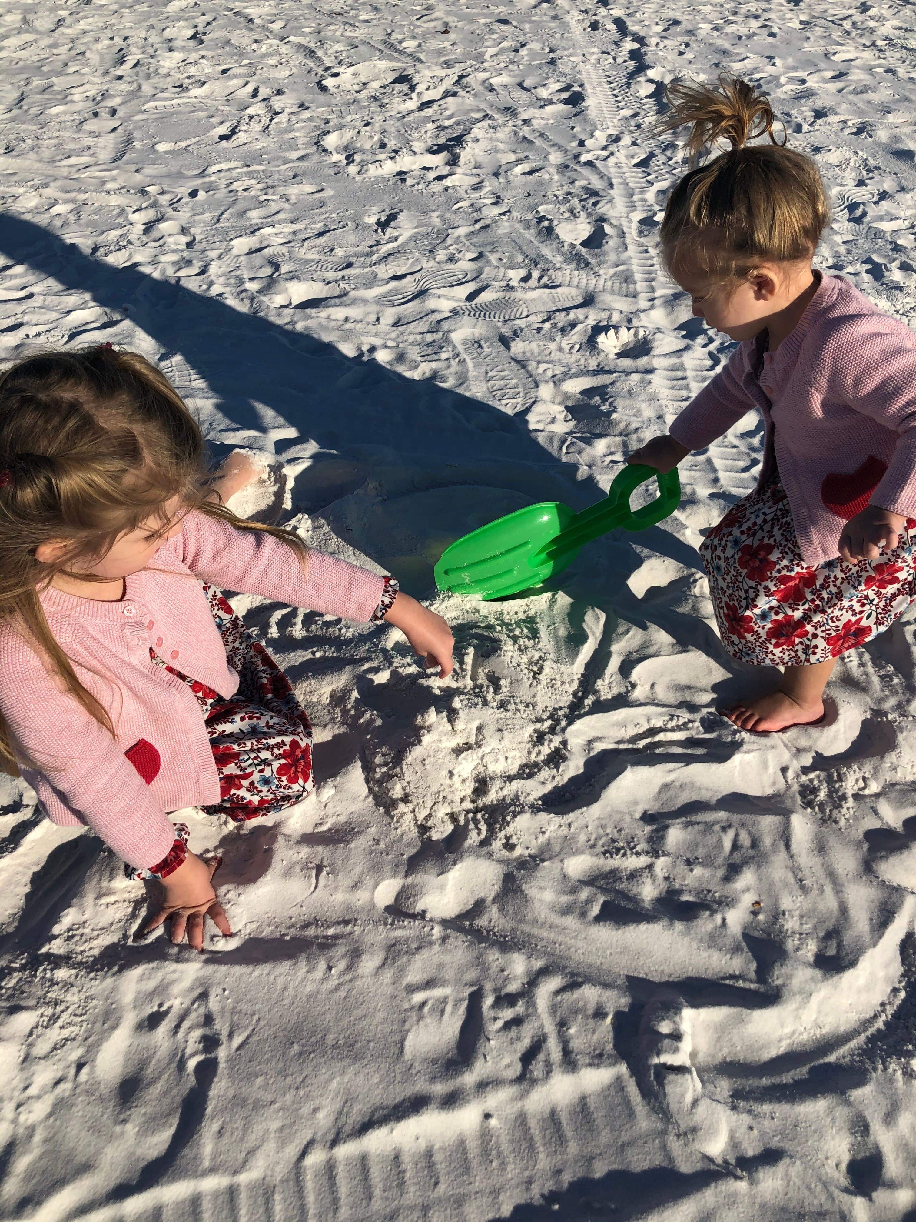 Children playing in the Sparkling white sand